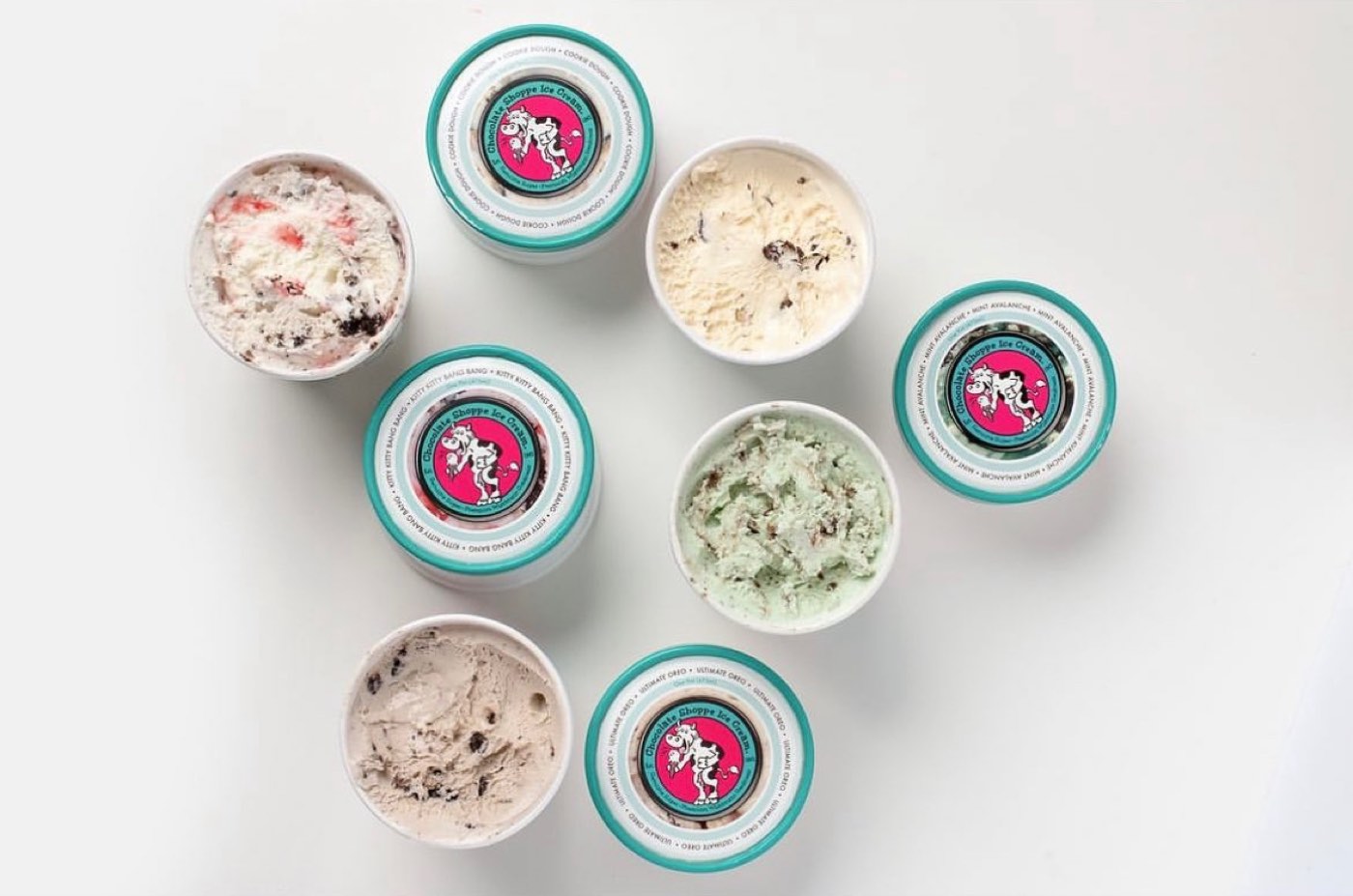 A spread of hand-dipped ice cream flavors in ROC cups